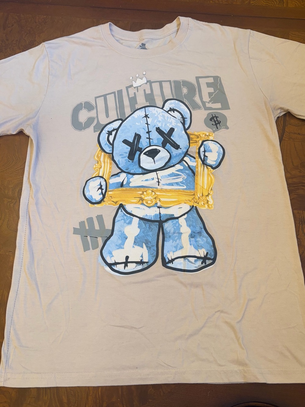 Culture Light Beige Teddy Graphic Tee with Blue & Gold Print